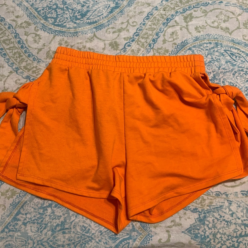 Love Highlight side tie shorts.